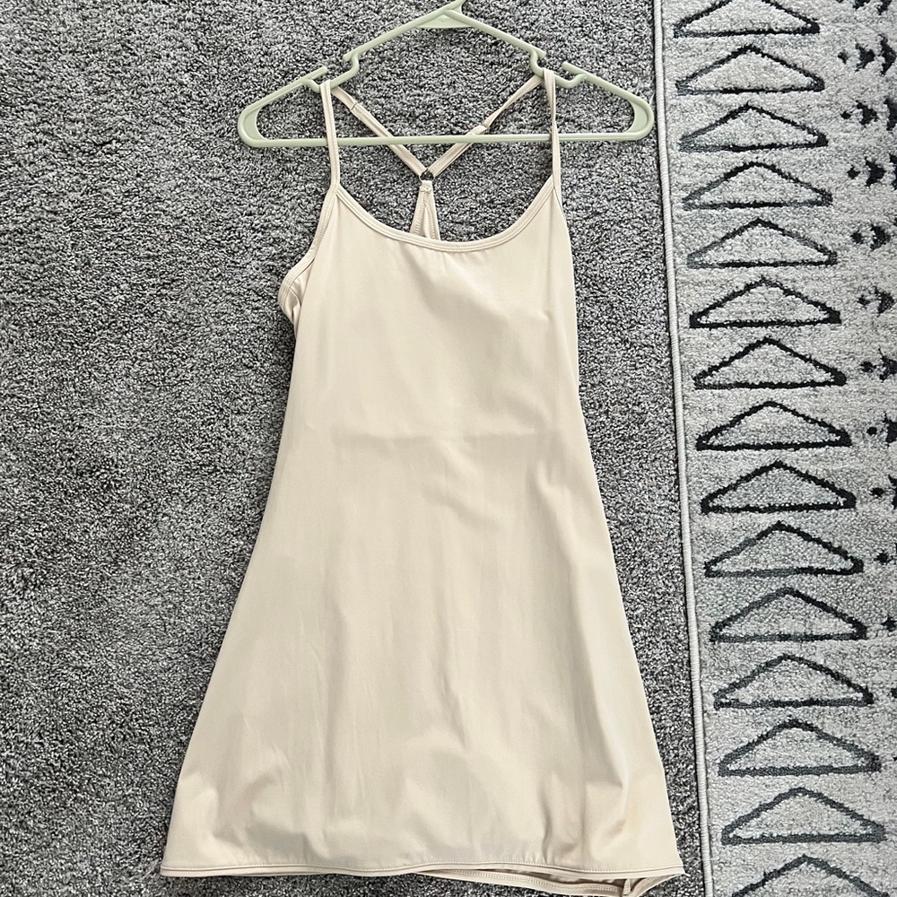 Cream active dress with built in bodysuit